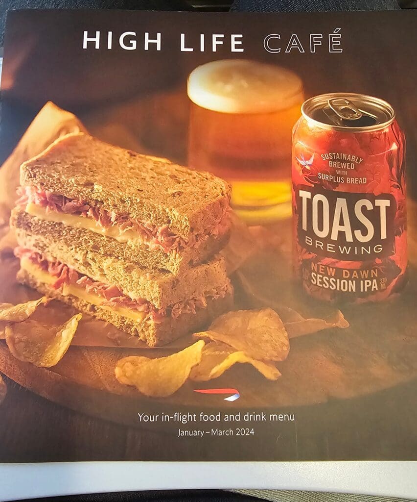 a sandwich and a can of beer