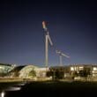 a large crane in front of a building