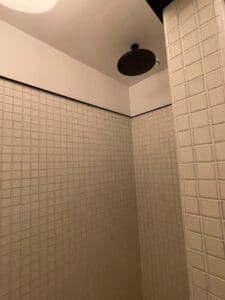 a shower with a shower head