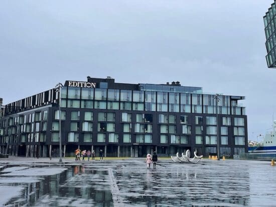 a building with windows and a fountain