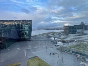 a large building next to a body of water