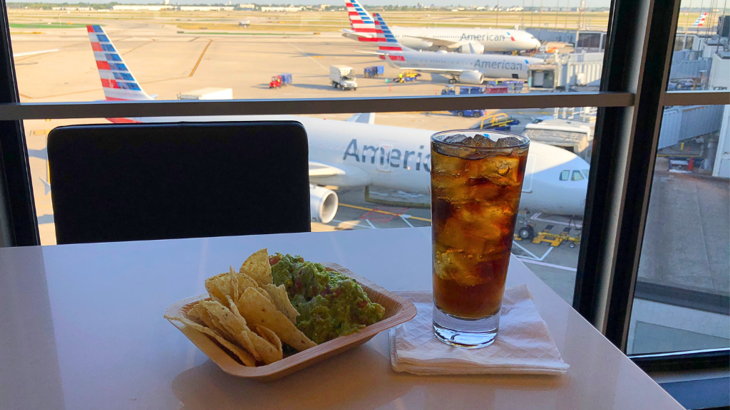 Guacamole and a soda served at an Admirals Club location