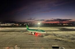 an airplane on a runway at night