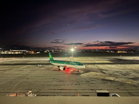 an airplane on a runway at night