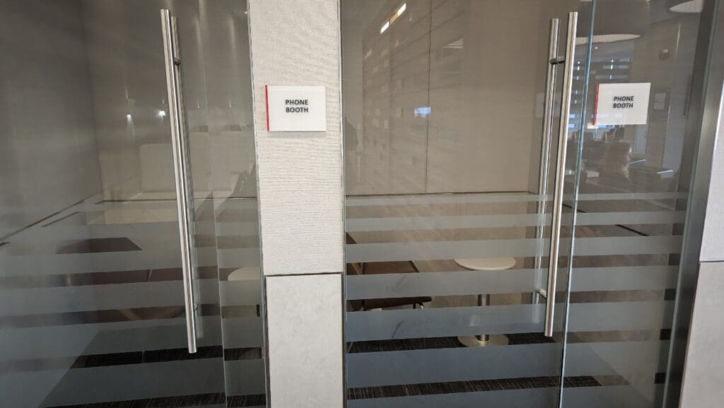 a glass door with a sign on it