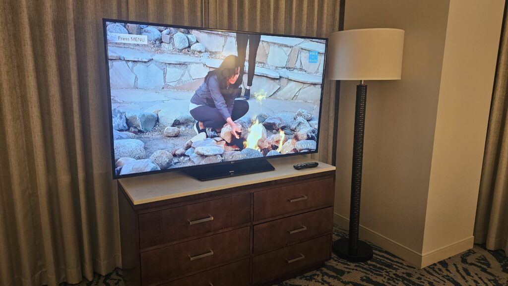 a television on a dresser