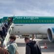 people boarding an airplane