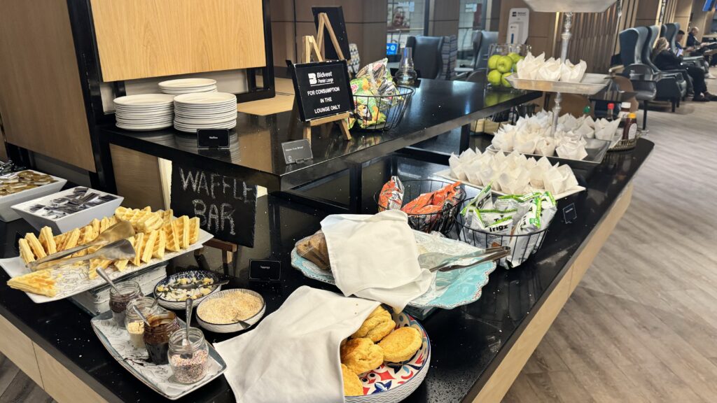 a buffet table with food and snacks