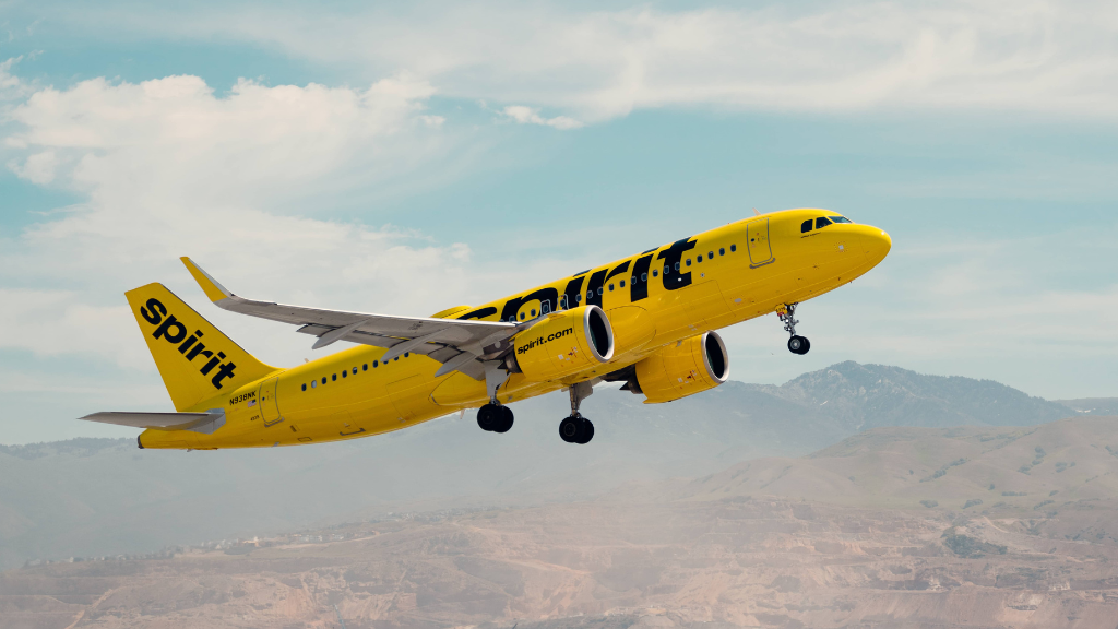 A Spirit Airlines aircraft taking off.