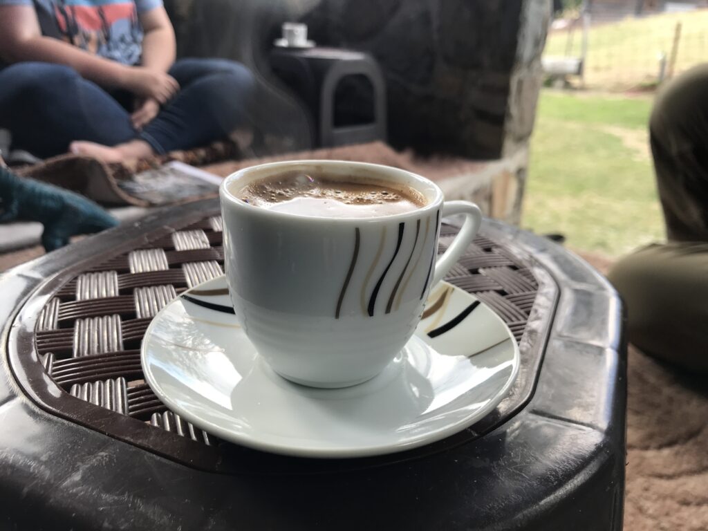 a cup of coffee on a table