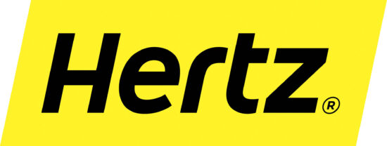 a yellow sign with black letters