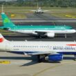 a group of airplanes on a runway