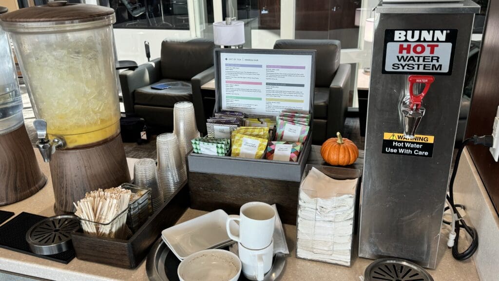 a table with a tray of tea and coffee