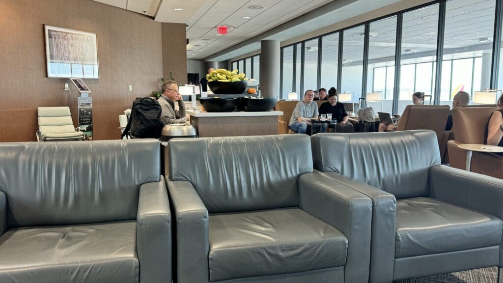 a group of people sitting in a lounge area