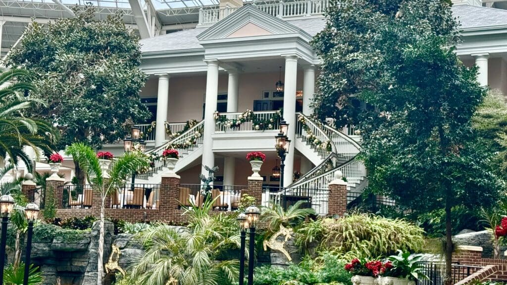 a building with a large staircase and trees