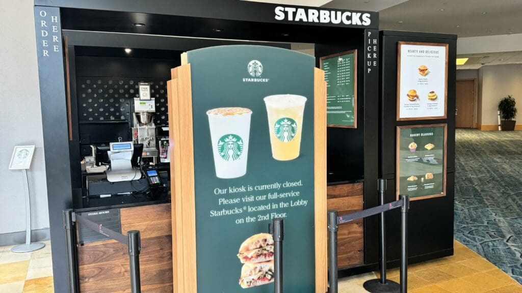 a sign outside of a starbucks restaurant