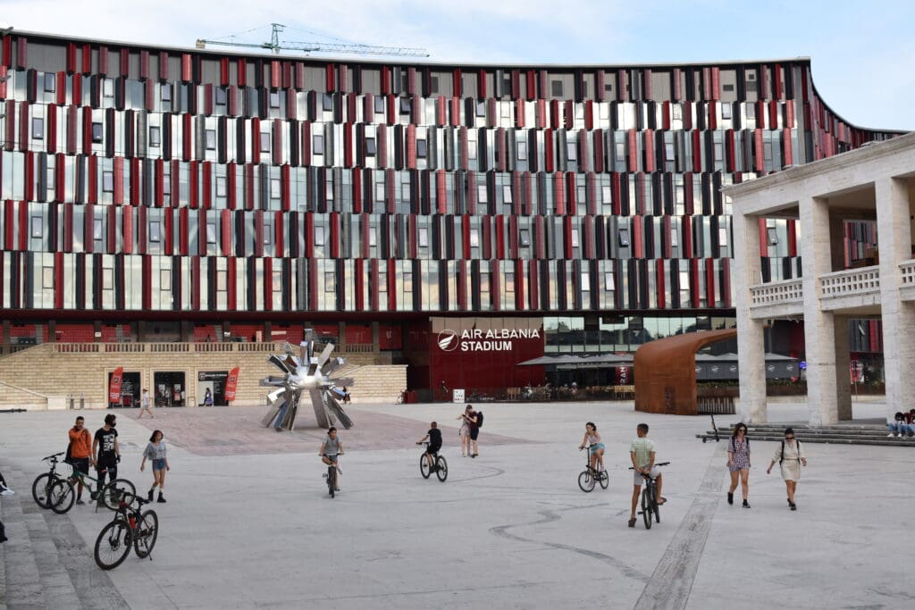 kids playing in front of Air Albania stadium