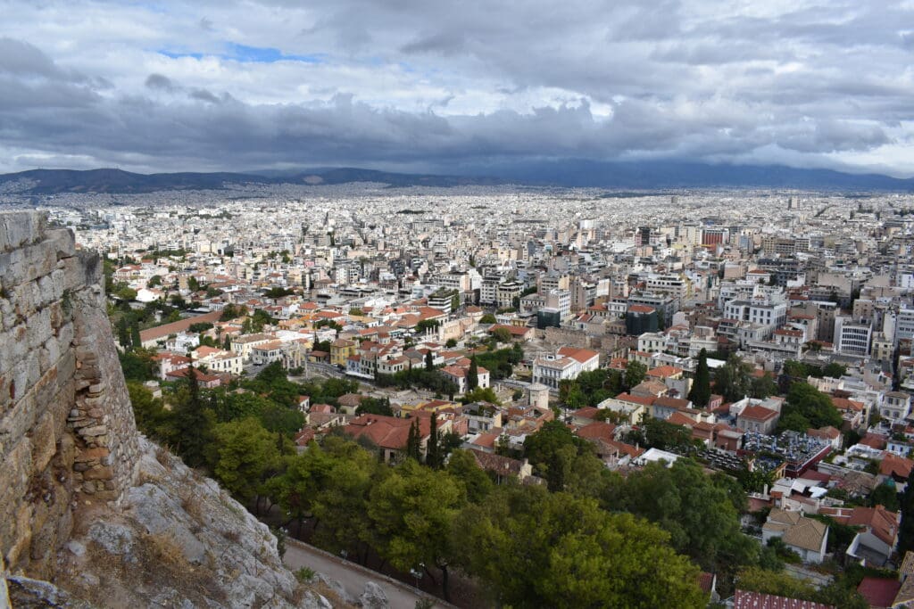 a city with many buildings and trees