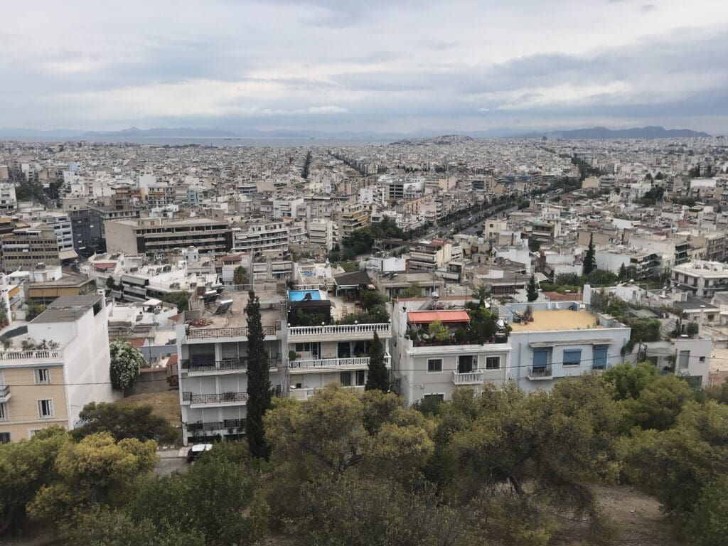 a city with many buildings and trees