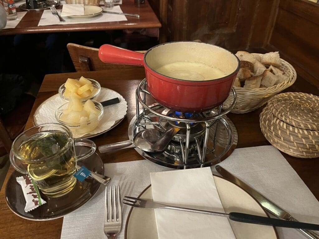 a fondue pot on a table