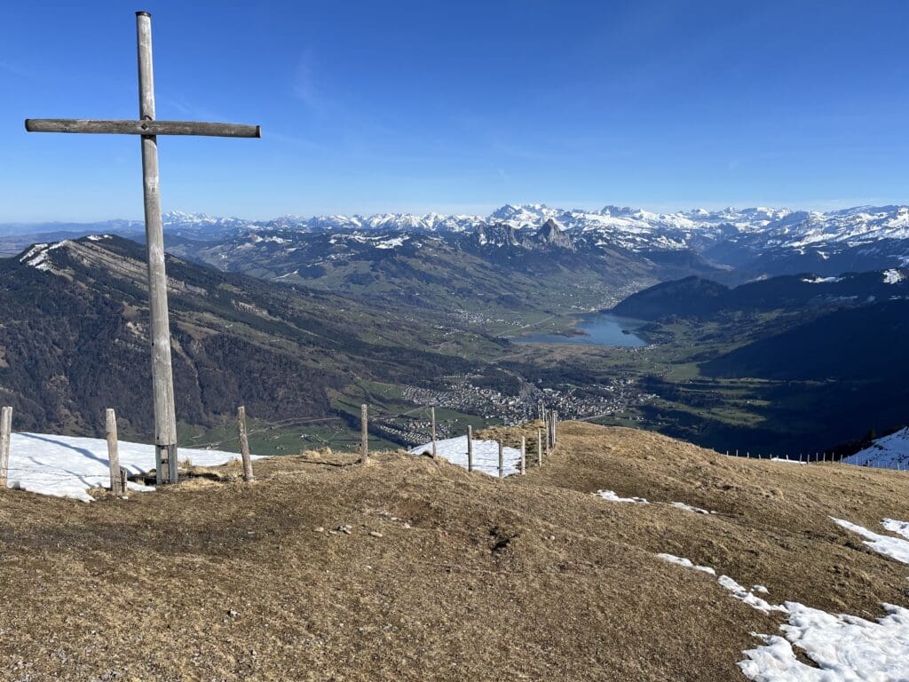 a cross on a mountain