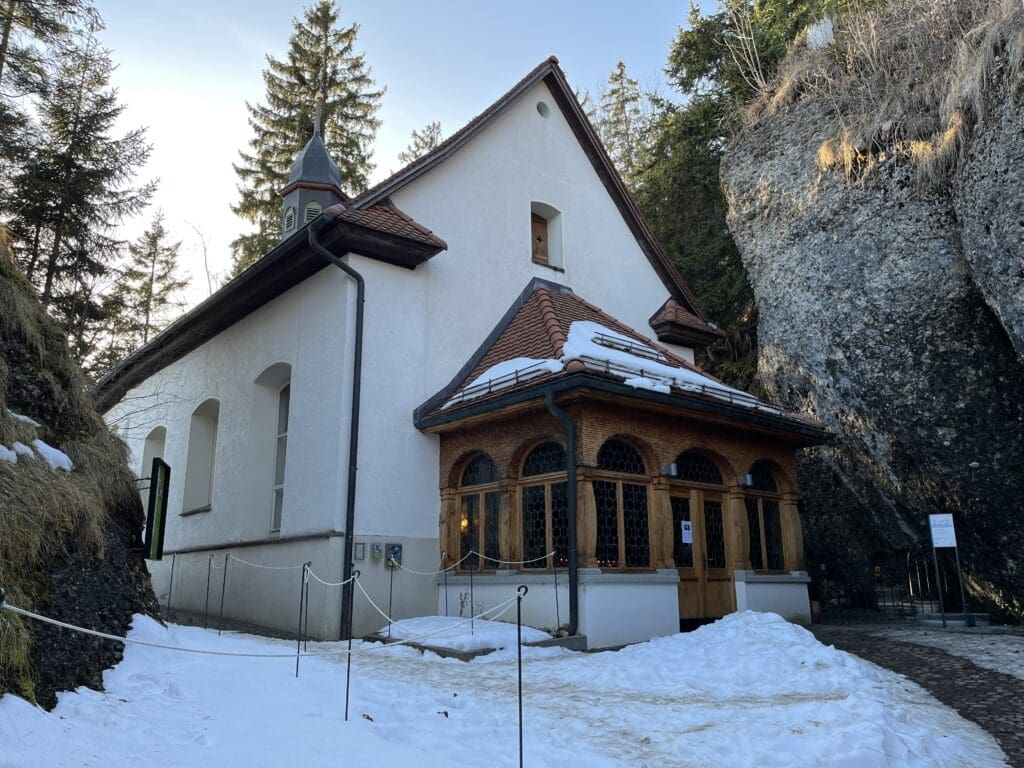 a building with snow on the ground