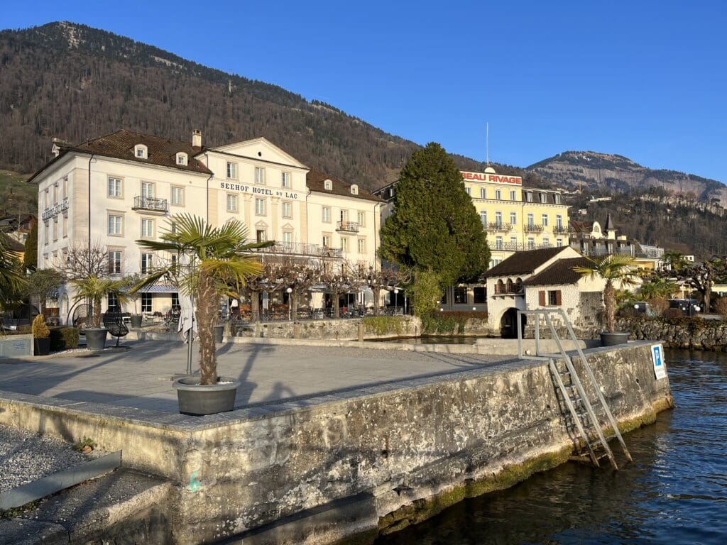 a building next to a body of water