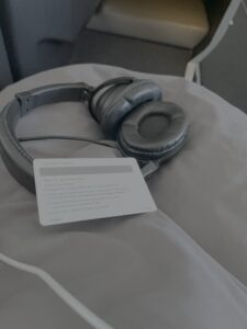 a headphones on a bed