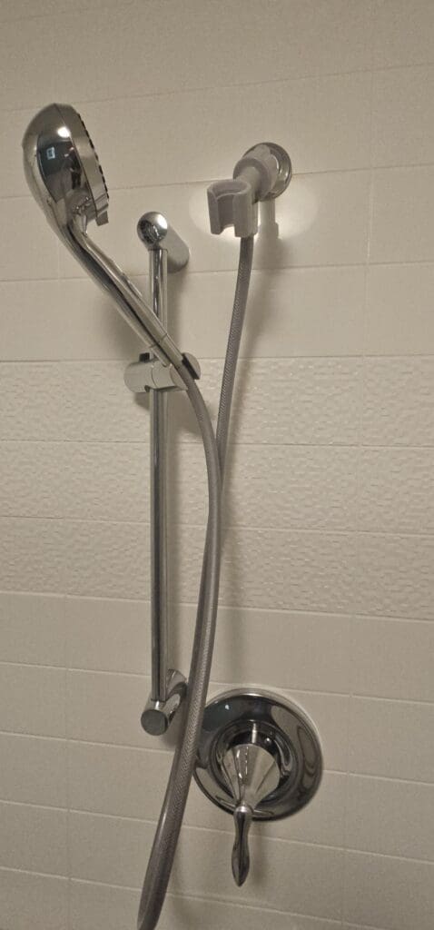 a shower head with a hose attached