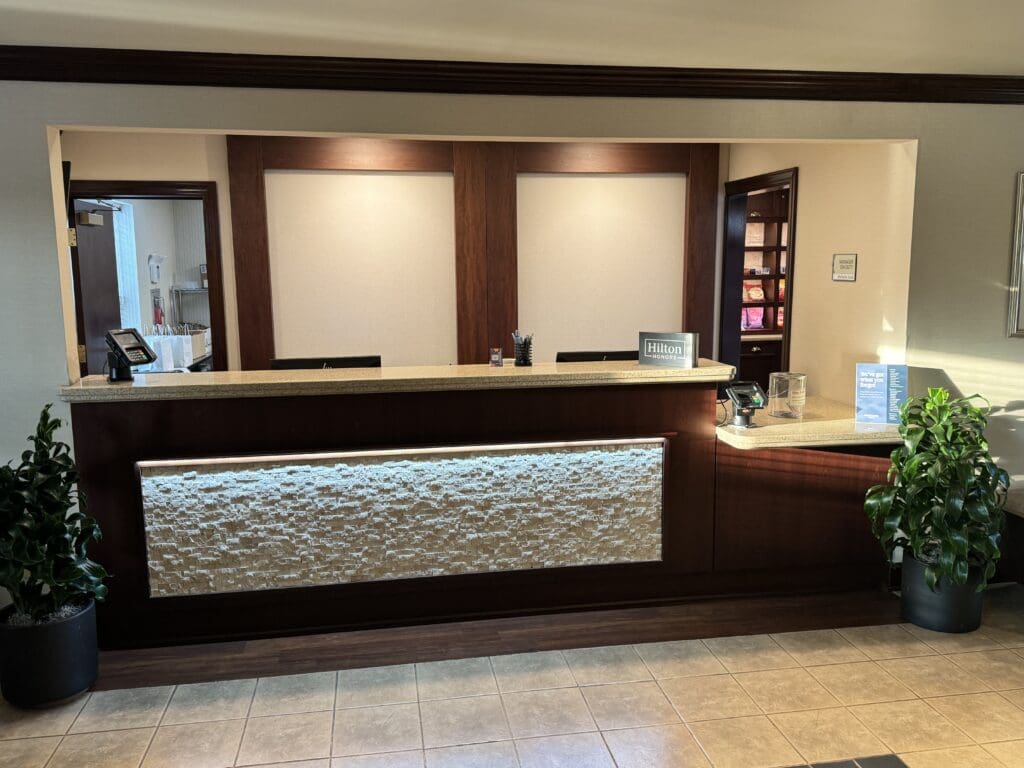 a reception desk in a hotel