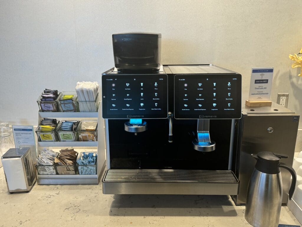 a coffee machine with a black screen