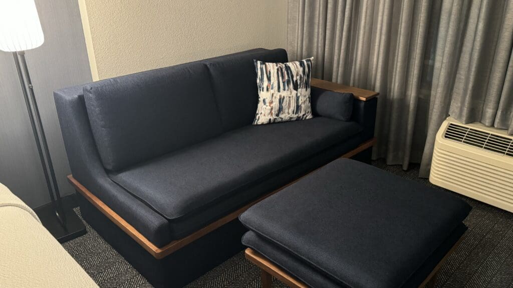 a couch with a pillow on it