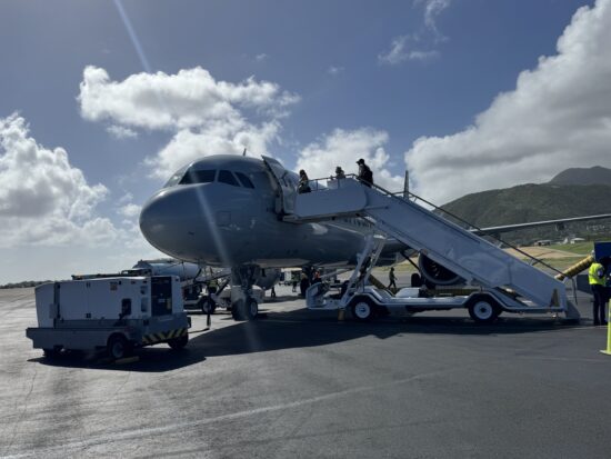 a plane with stairs going up to it