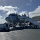 a plane with stairs going up to it