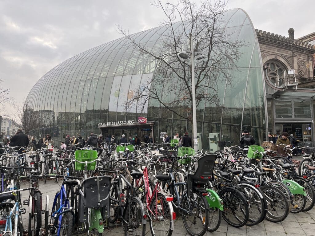 a group of bicycles parked in front of a building