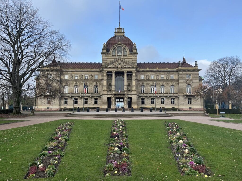 a large building with a flag on the top