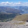 a view of a river and mountains from a mountain