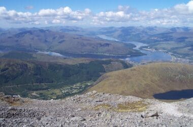 a view of a river and mountains from a mountain