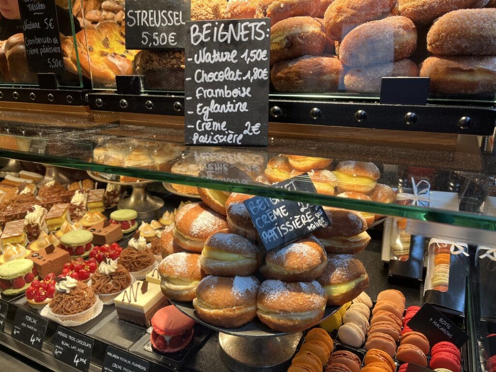 a display case with pastries and pastries