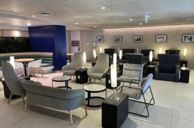 a room with chairs and tables