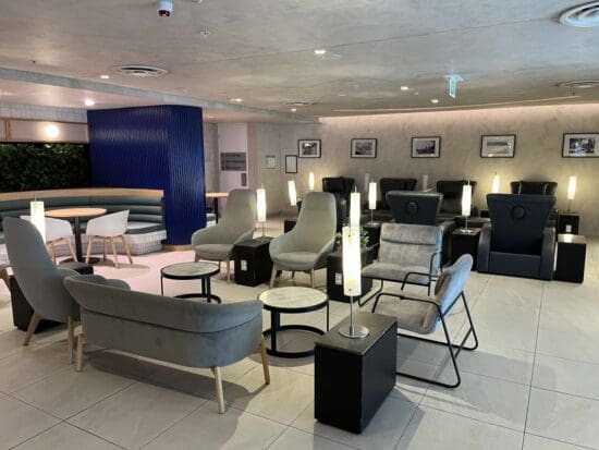 a room with chairs and tables