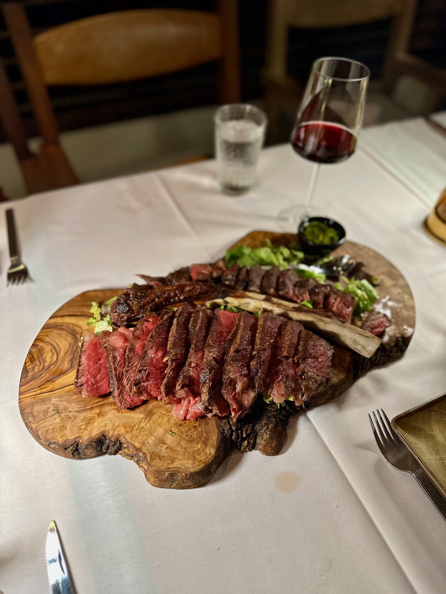 a plate of steak and salad