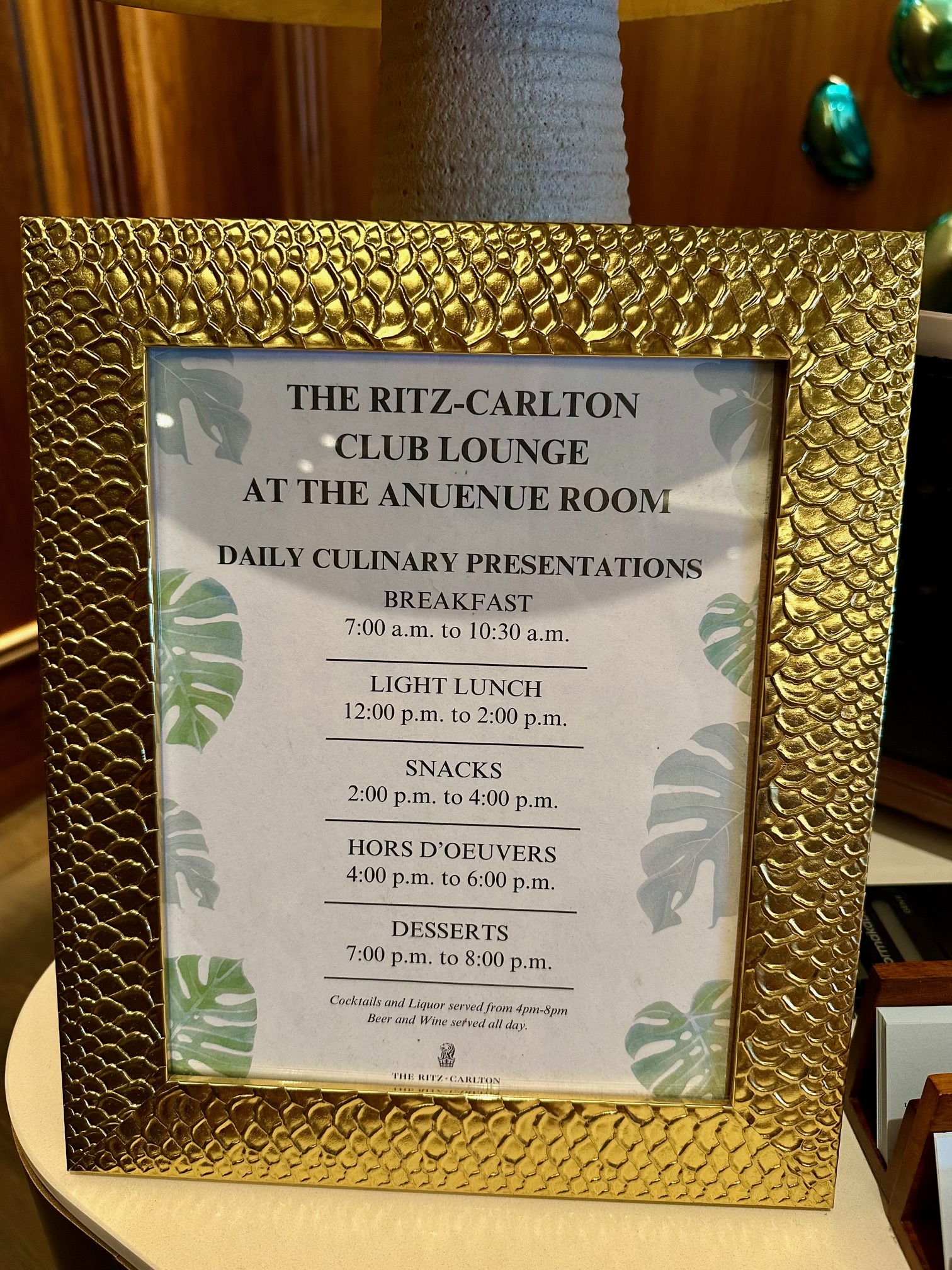 a gold frame with a menu