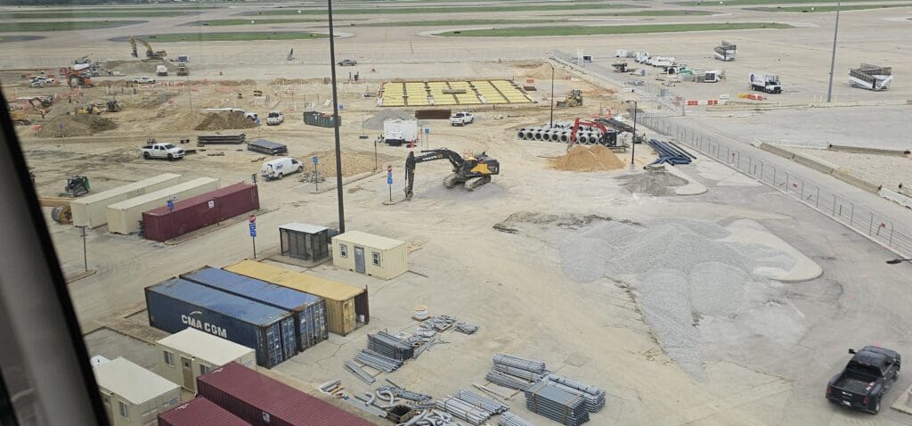 a construction site with a crane and other construction equipment