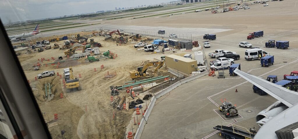 a construction site with vehicles and trucks