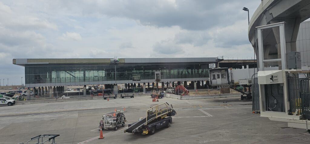 a large building with a lot of construction equipment