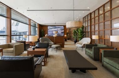a room with furniture and a large window