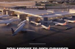 an airport with airplanes parked in the terminal