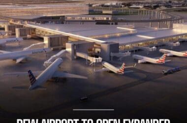 an airport with airplanes parked in the terminal