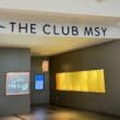 a sign above a wall